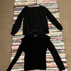 Long sleeve blouses. Both have puffy sleeves